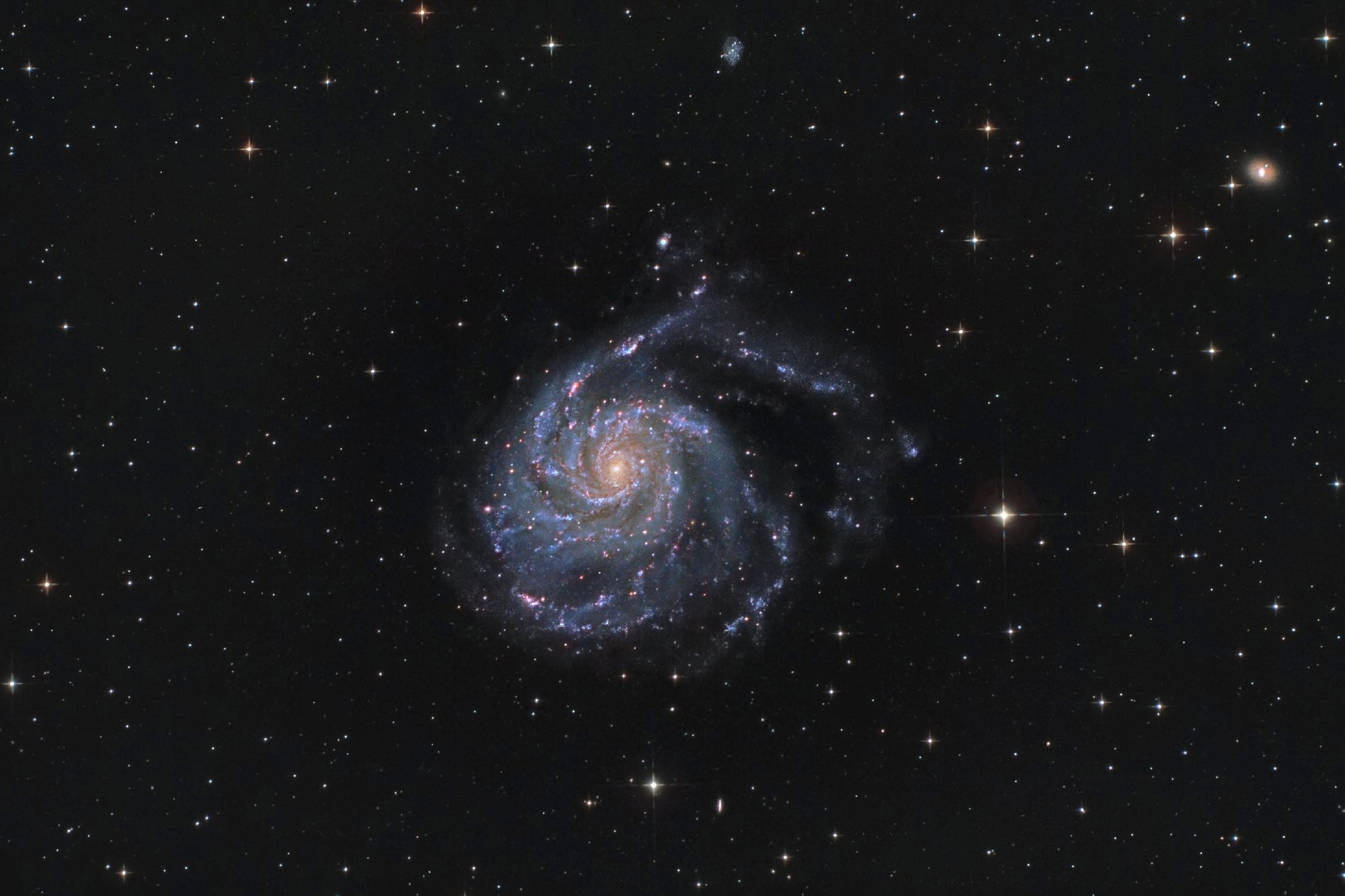 Spirální galaxie M101 - "Větrník" - větší detail.